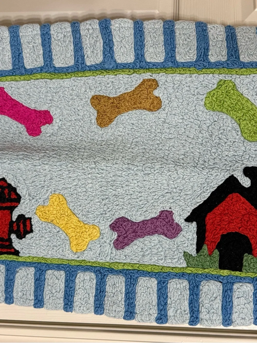 Cheerful Blue Dog Bone Door Mat with Multicolor Accents